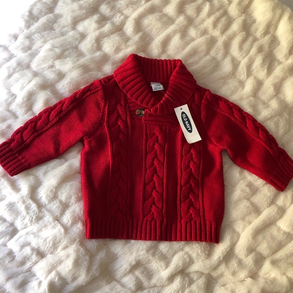 red infant sweater